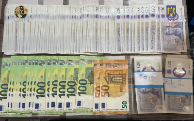 DIICOT: Percheziţii la o grupare care a retras ilegal peste 70 de milioane de lei de la o bancă din România
