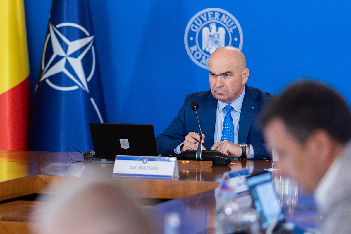 Bolojan a cerut ministerelor și instituțiilor aflate în subordine reducerea deplasărilor externe