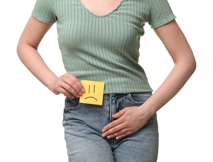 Woman,Holding,Sticky,Note,With,Drawn,Sad,Face,And,Suffering