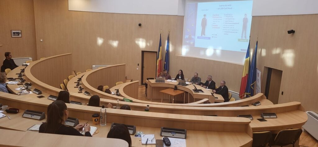 Ofițerii anticorupție, la acțiunea de la sediul Consiliului Județean Sibiu. Foto: SJA Sibiu
